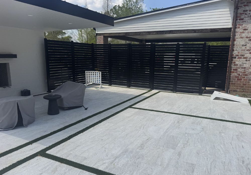 Custom aluminum fence surrounding a landscaped property in Baton Rouge