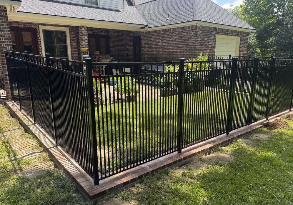 Custom metal fence with decorative picket design in Baton Rouge