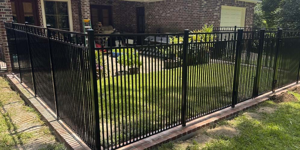 Custom metal fence with decorative picket design in Baton Rouge
