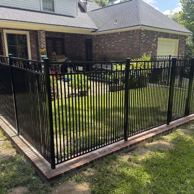 Custom metal fence with decorative picket design in Baton Rouge