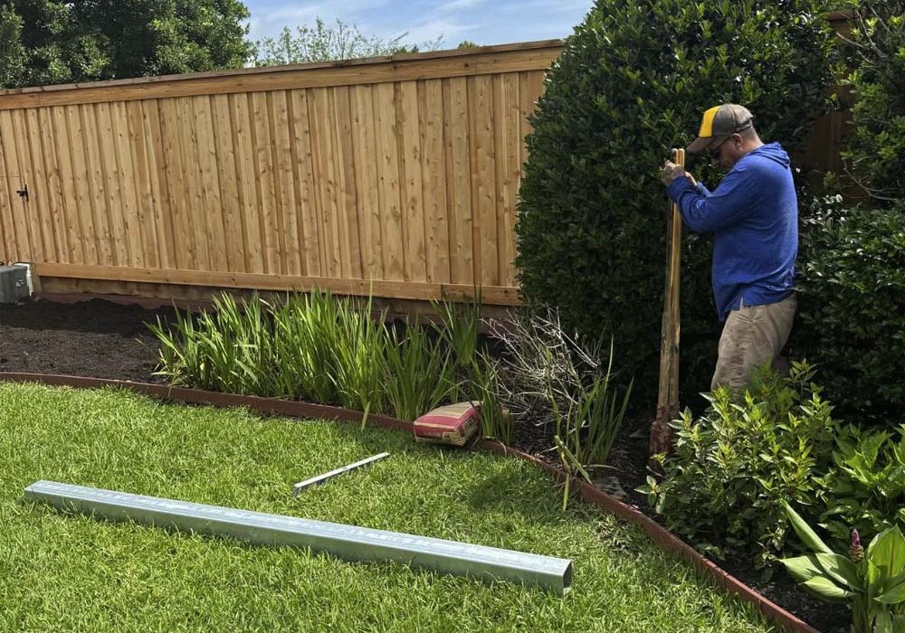 Custom wood privacy fence installed around a residential backyard in Baton Rouge