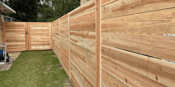 Finished wood fence project
