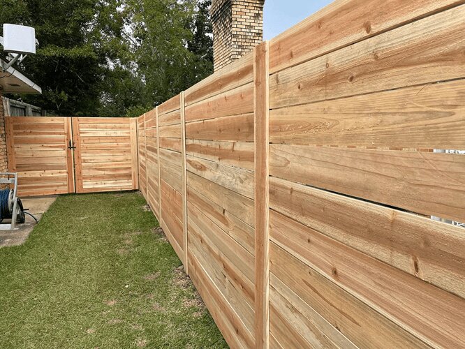 Finished wood fence project